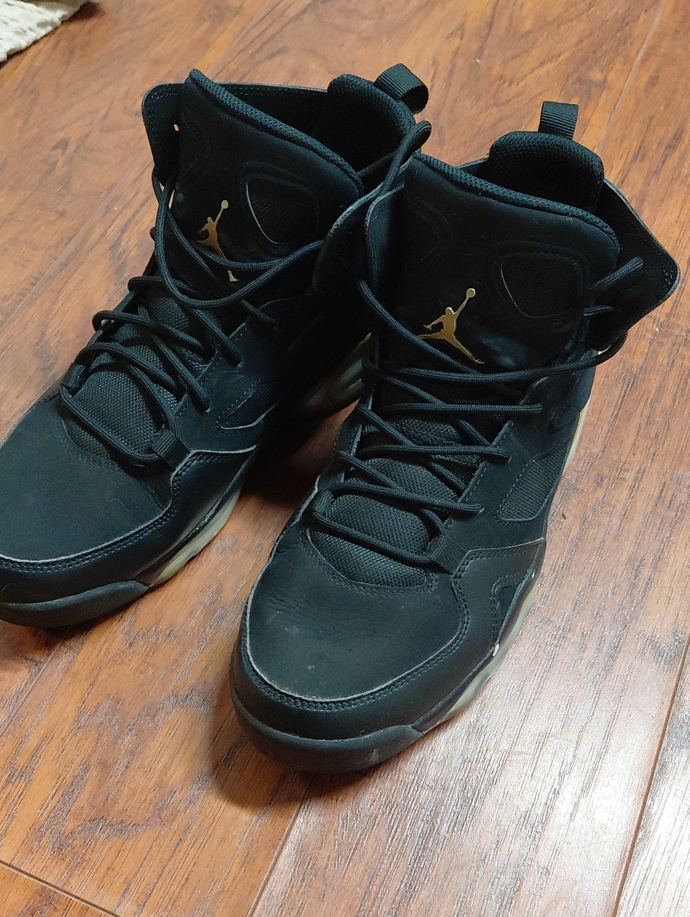 Jordan Men's Mid-Top Basketball Sneakers in Black with Gold Jumpman